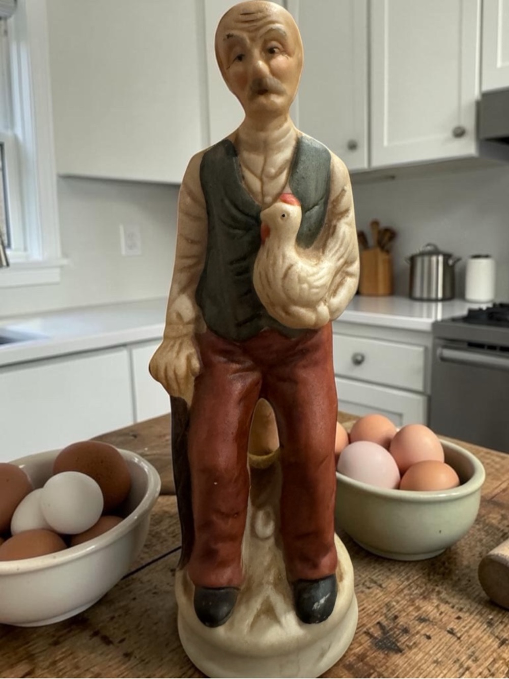 Hand-Painted Ceramic Farmer Figurine in Green and Brown 7”